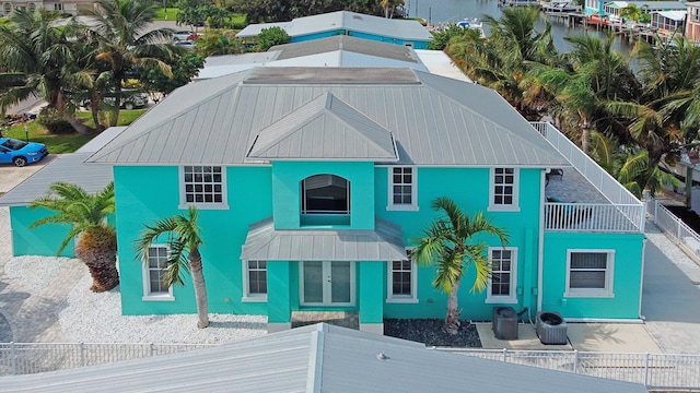 view of front of home with cooling unit