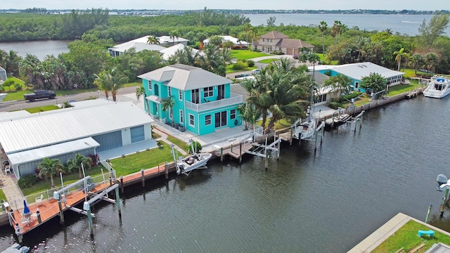 drone / aerial view with a water view