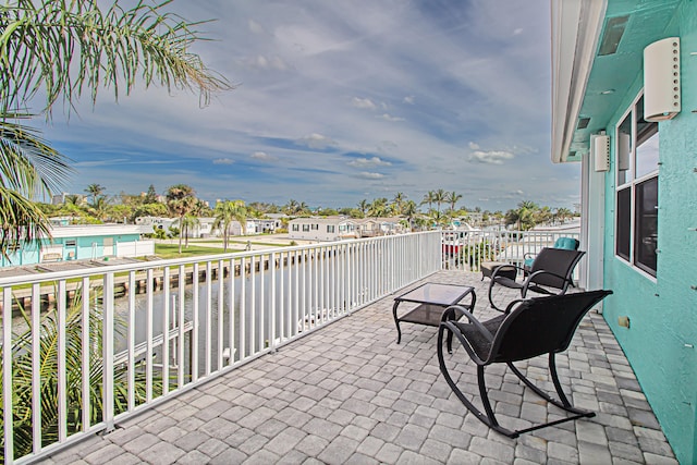 view of patio with a balcony