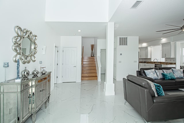 living room featuring ceiling fan