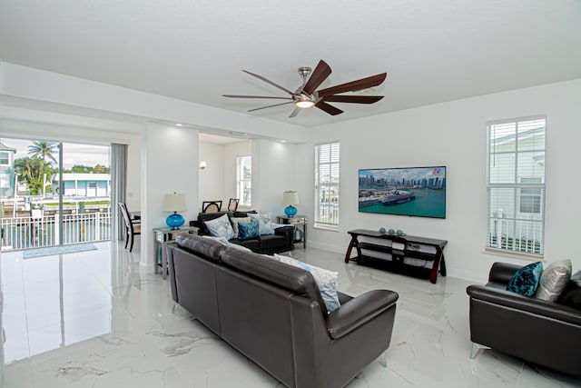 living room featuring ceiling fan