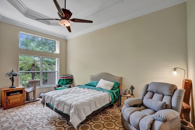 bedroom with multiple windows, ceiling fan, and crown molding