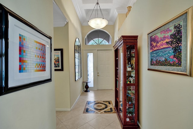 tiled entryway with crown molding