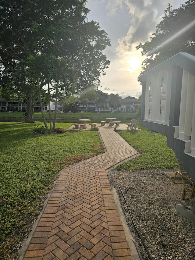 view of yard at dusk