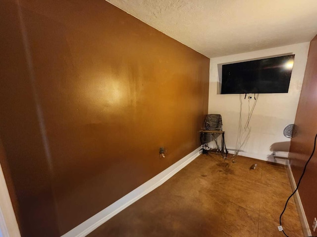 interior space featuring a textured ceiling