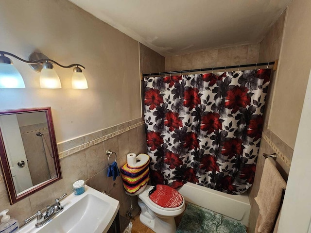 full bathroom with toilet, tasteful backsplash, shower / bathtub combination with curtain, sink, and tile walls