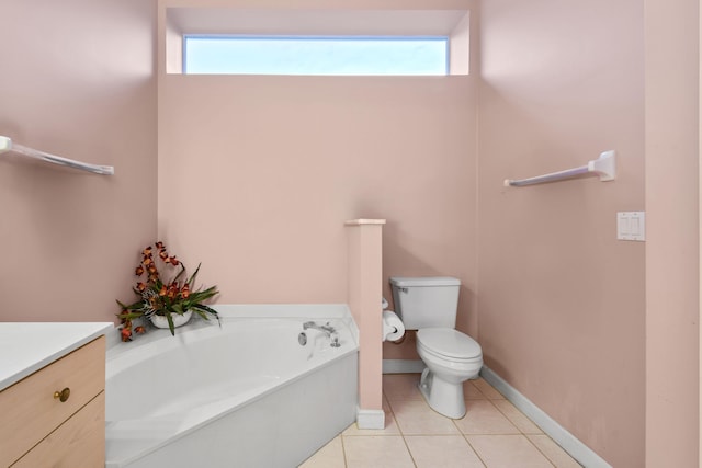 bathroom with vanity, toilet, a healthy amount of sunlight, and a bathing tub