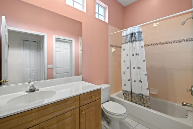 full bathroom with tile patterned flooring, vanity, toilet, and shower / bath combination with curtain