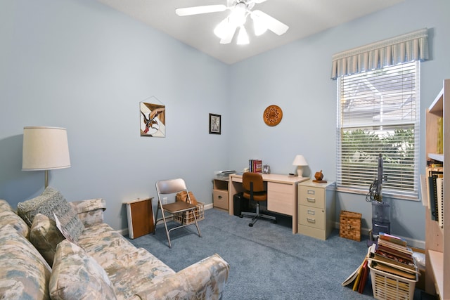 carpeted home office with ceiling fan