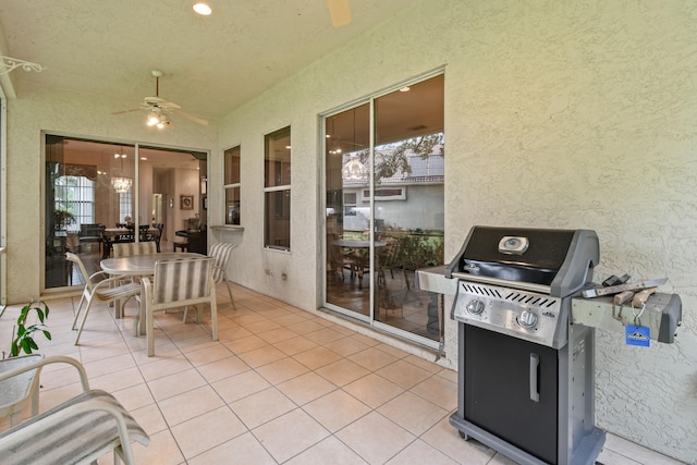 view of patio / terrace with ceiling fan and grilling area