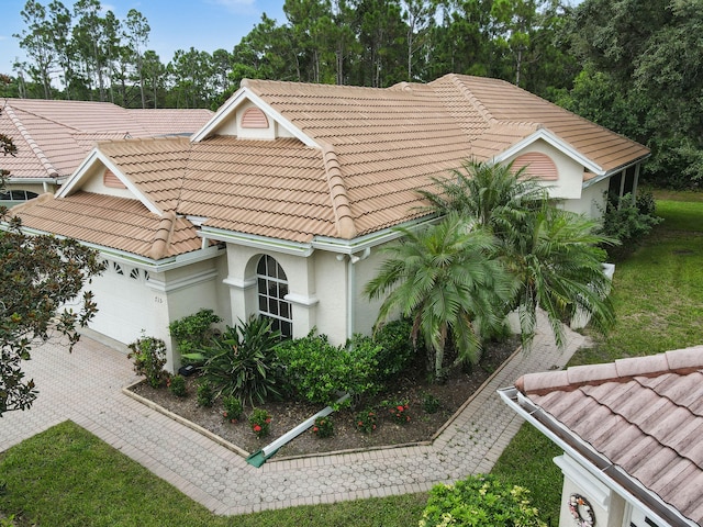 view of front of property with a garage