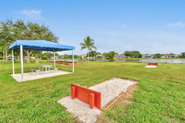 view of yard with a water view and a gazebo