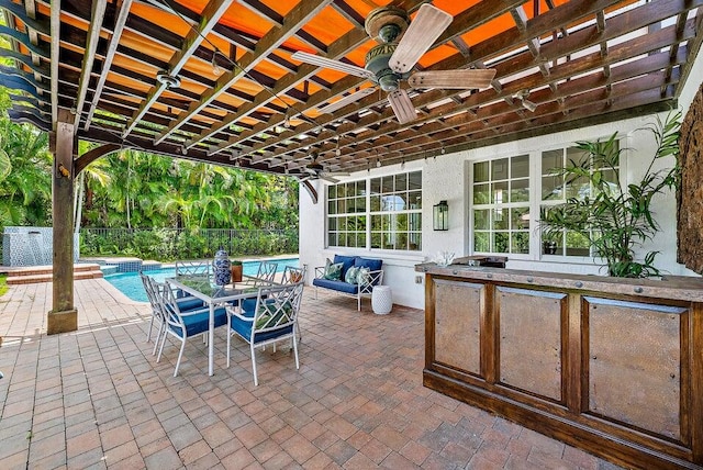 view of patio / terrace featuring ceiling fan