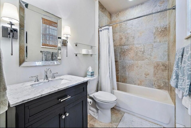 full bathroom with vanity, toilet, and shower / tub combo with curtain