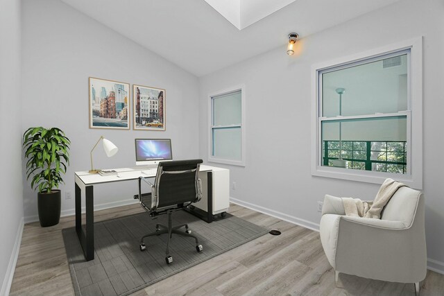 bathroom with vanity, toilet, and tiled shower