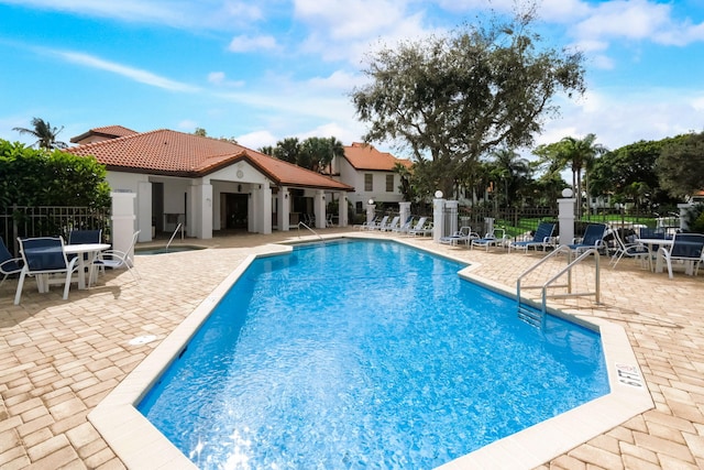 view of pool with a patio