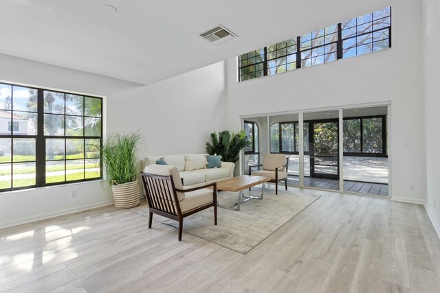 unfurnished living room with hardwood / wood-style flooring