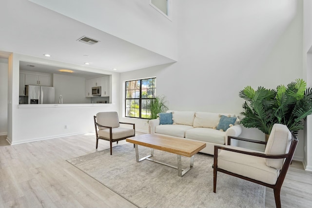 living room featuring light hardwood / wood-style flooring