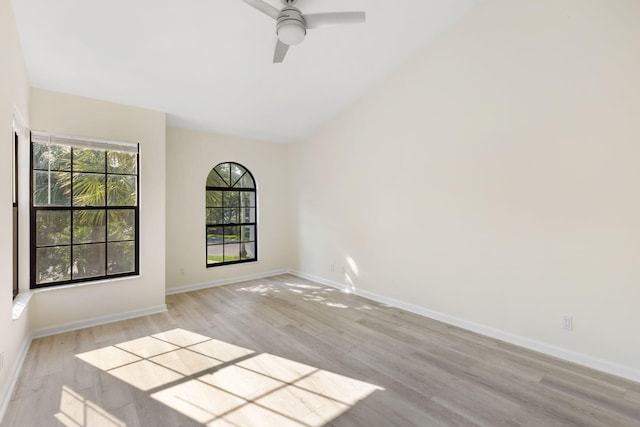 empty room featuring light hardwood / wood-style flooring and ceiling fan