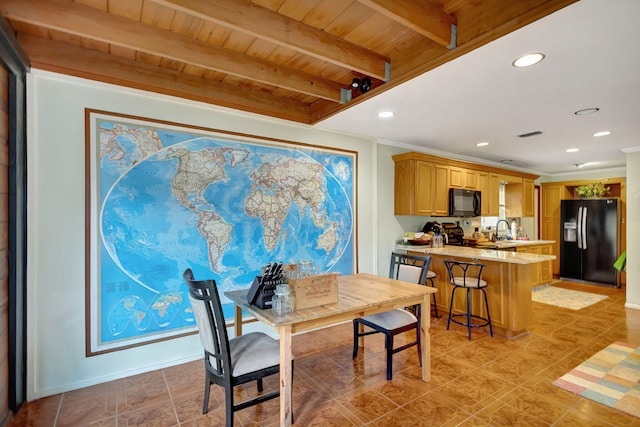 tiled dining room with beam ceiling, wooden ceiling, and sink