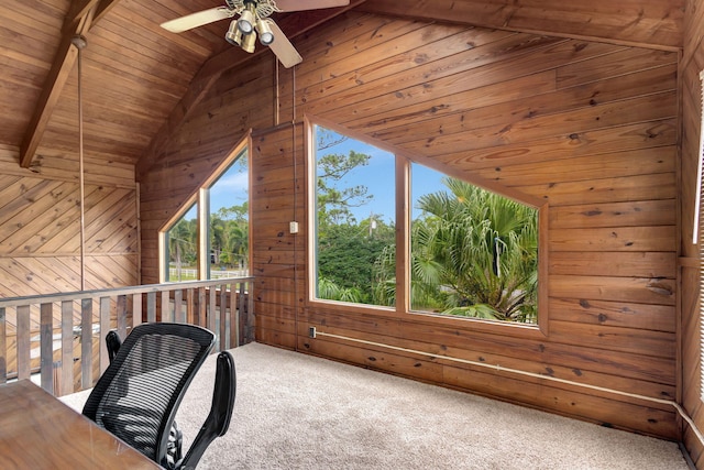 unfurnished office with carpet flooring, wood ceiling, ceiling fan, and wood walls