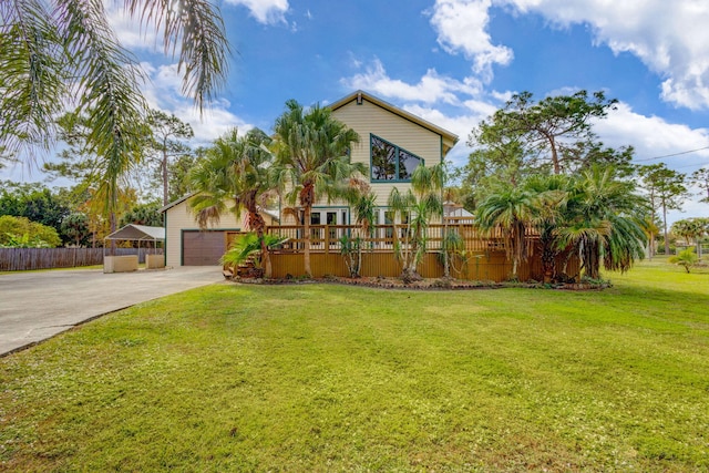 view of front facade featuring a front lawn and a garage