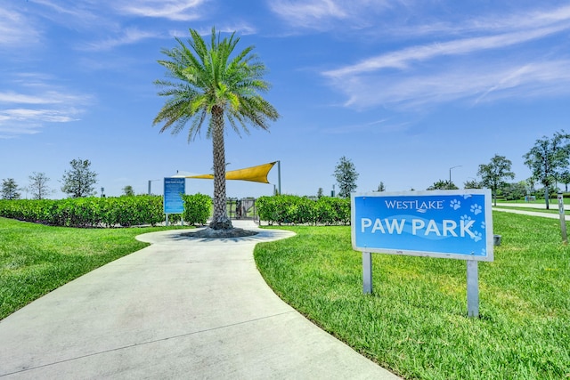 view of community featuring a yard