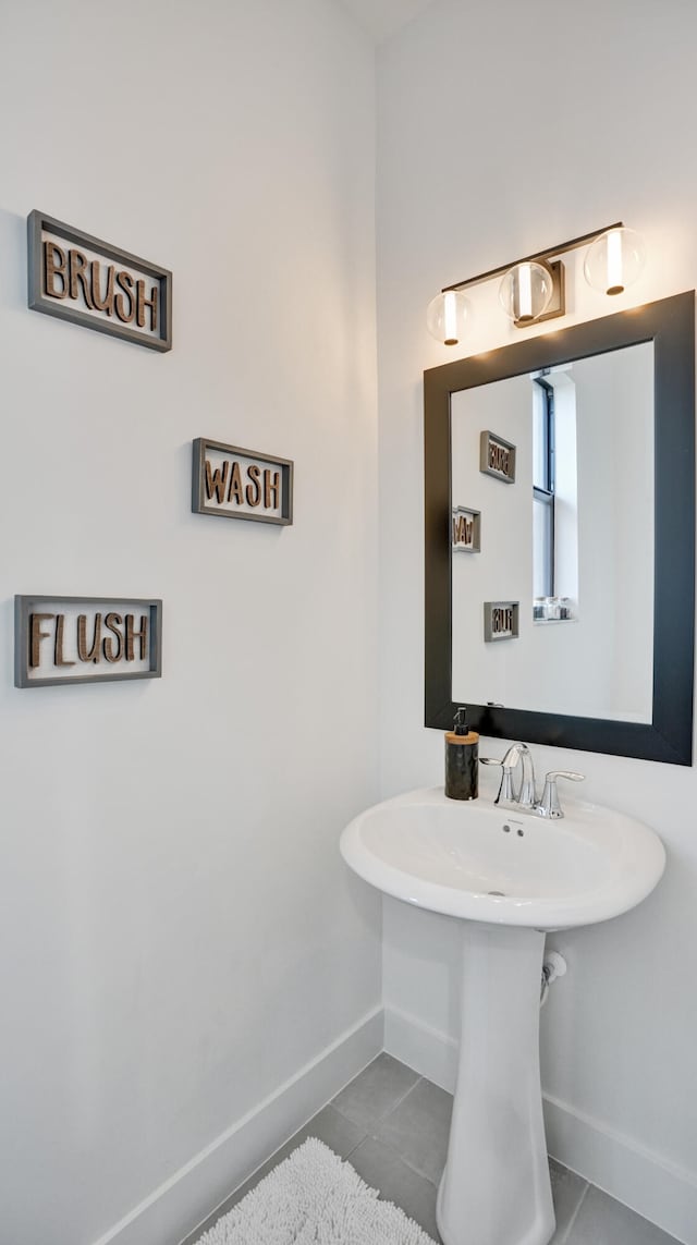 bathroom with tile patterned flooring