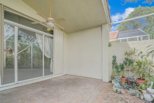 view of patio with ceiling fan