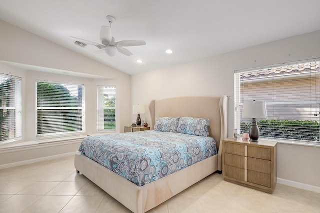 bedroom featuring light tile patterned flooring, vaulted ceiling, and ceiling fan