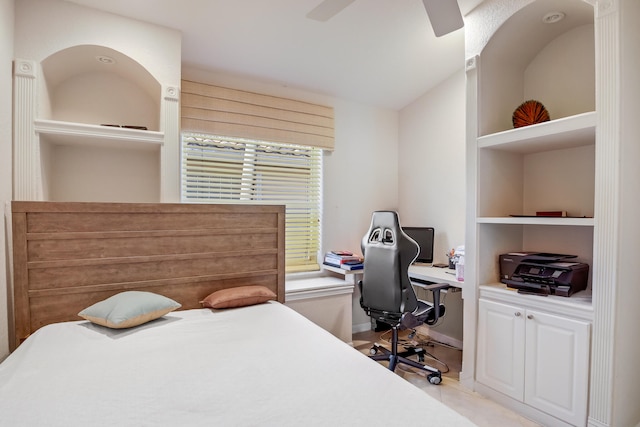 tiled bedroom with ceiling fan