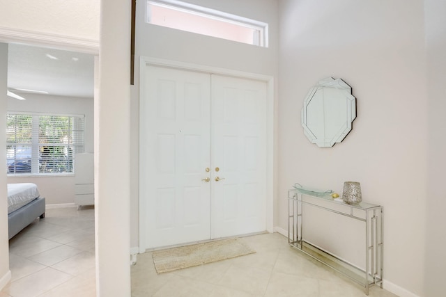 entrance foyer featuring light tile patterned flooring