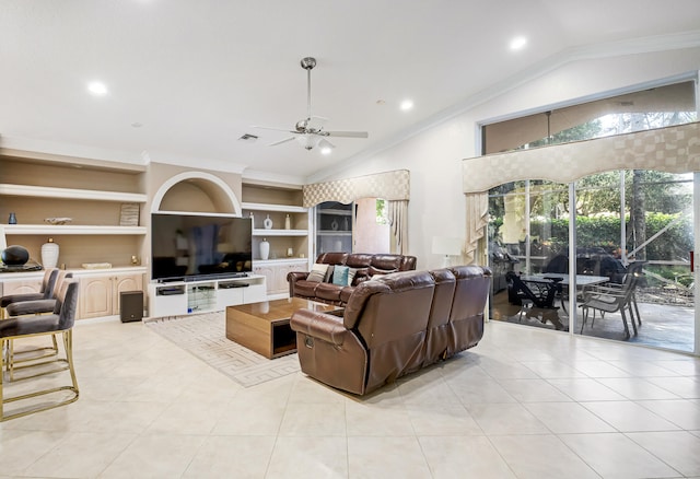 tiled living room with lofted ceiling, ornamental molding, ceiling fan, and built in shelves