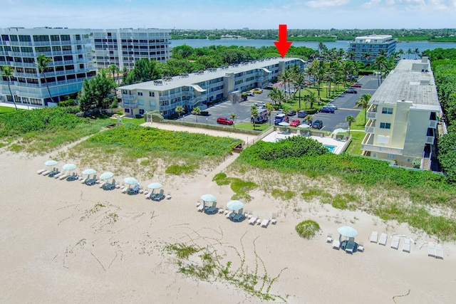 birds eye view of property featuring a water view