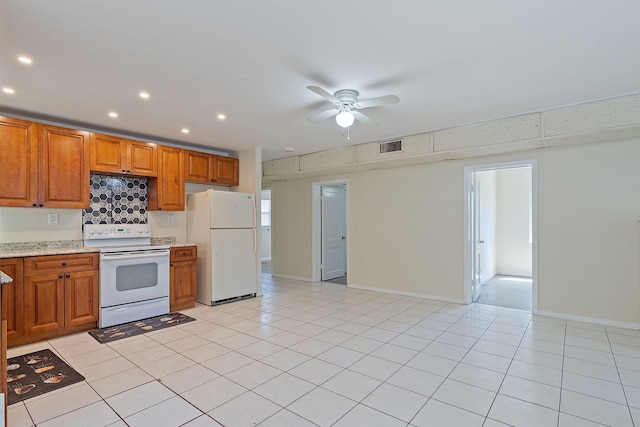 kitchen featuring white appliances, light tile patterned floors, and ceiling fan