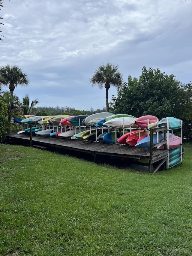 view of parking with a boat dock