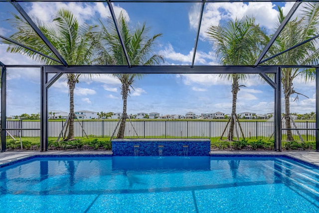 view of swimming pool featuring pool water feature