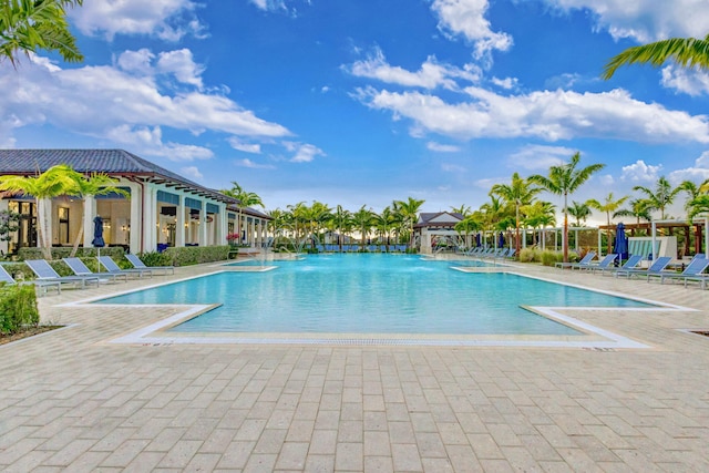 view of pool featuring a patio