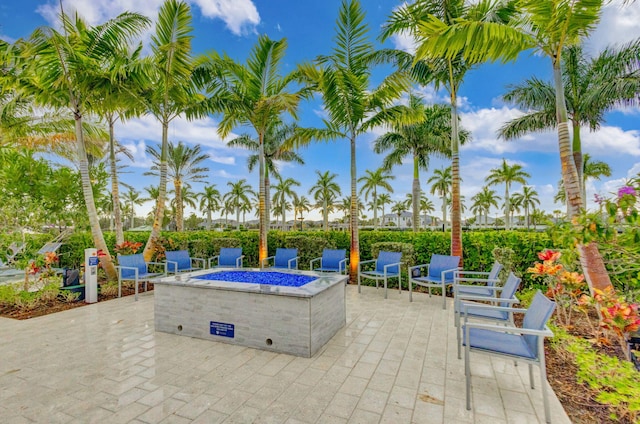 view of patio featuring an outdoor fire pit