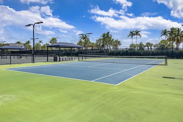 view of tennis court with a gazebo