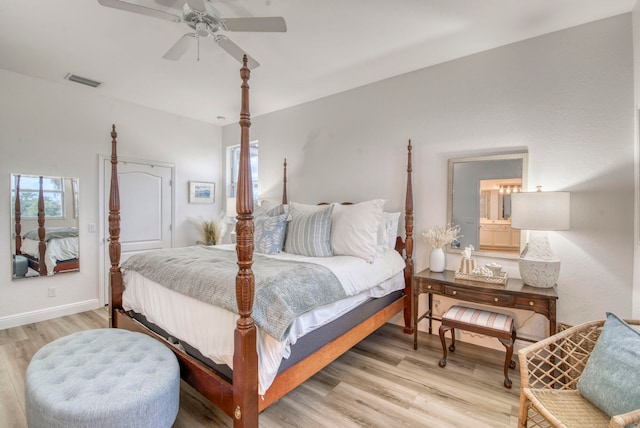 bedroom with ceiling fan and wood-type flooring