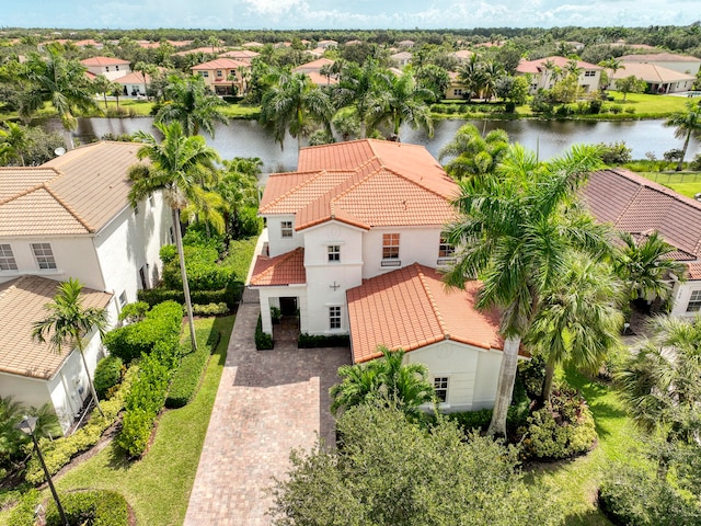 birds eye view of property featuring a water view