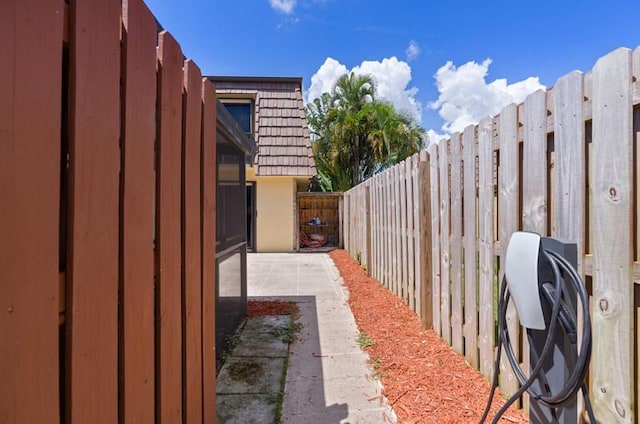 632 Springdale Cir, Palm Springs, FL 33461 - fenced backyard with a patio