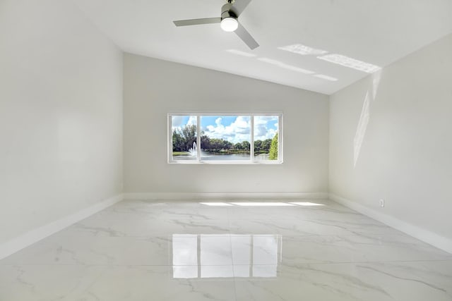 unfurnished room featuring lofted ceiling and ceiling fan