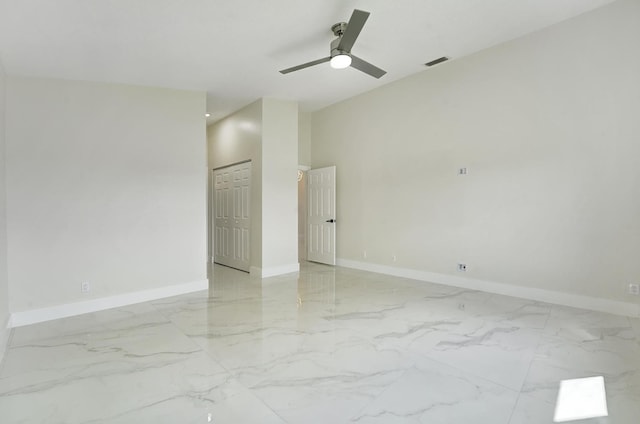 unfurnished room featuring ceiling fan