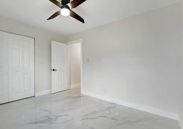 unfurnished bedroom with a closet and ceiling fan