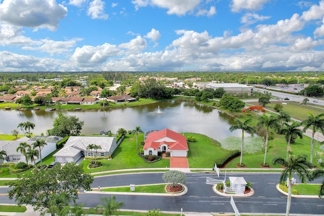 drone / aerial view with a water view