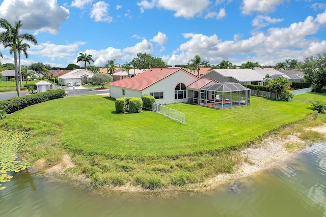 birds eye view of property with a water view