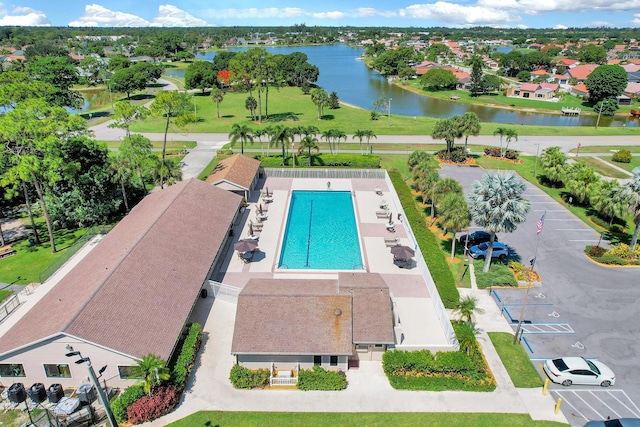 drone / aerial view with a water view