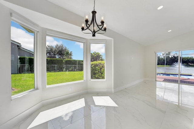 unfurnished dining area with lofted ceiling and an inviting chandelier